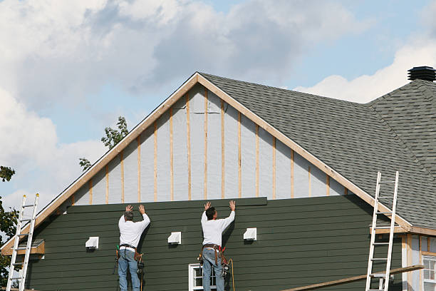 Professional Siding technician working in Scotland, PA